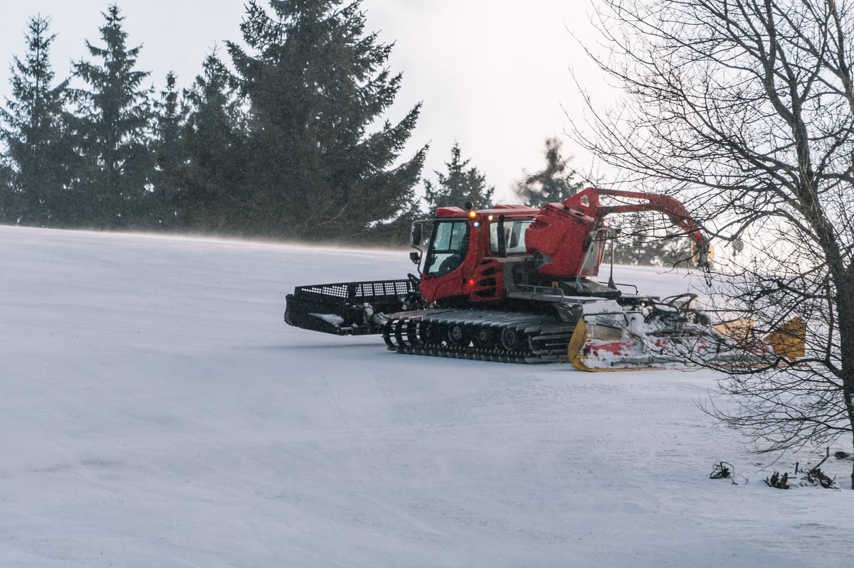 Catskiing Kazakhstan team — snowcat on a powder day in the Altai